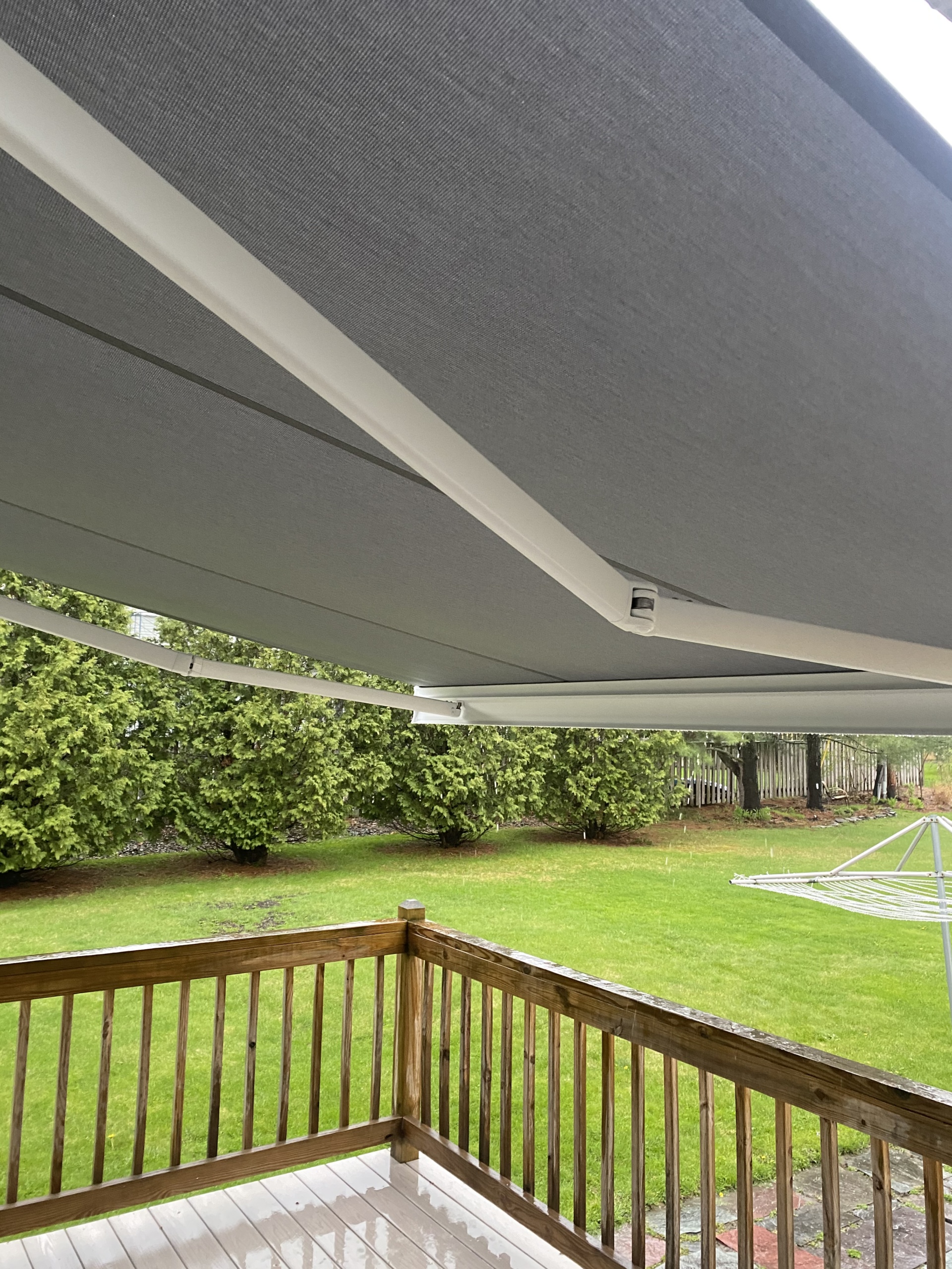 Cassette awning over a back deck.